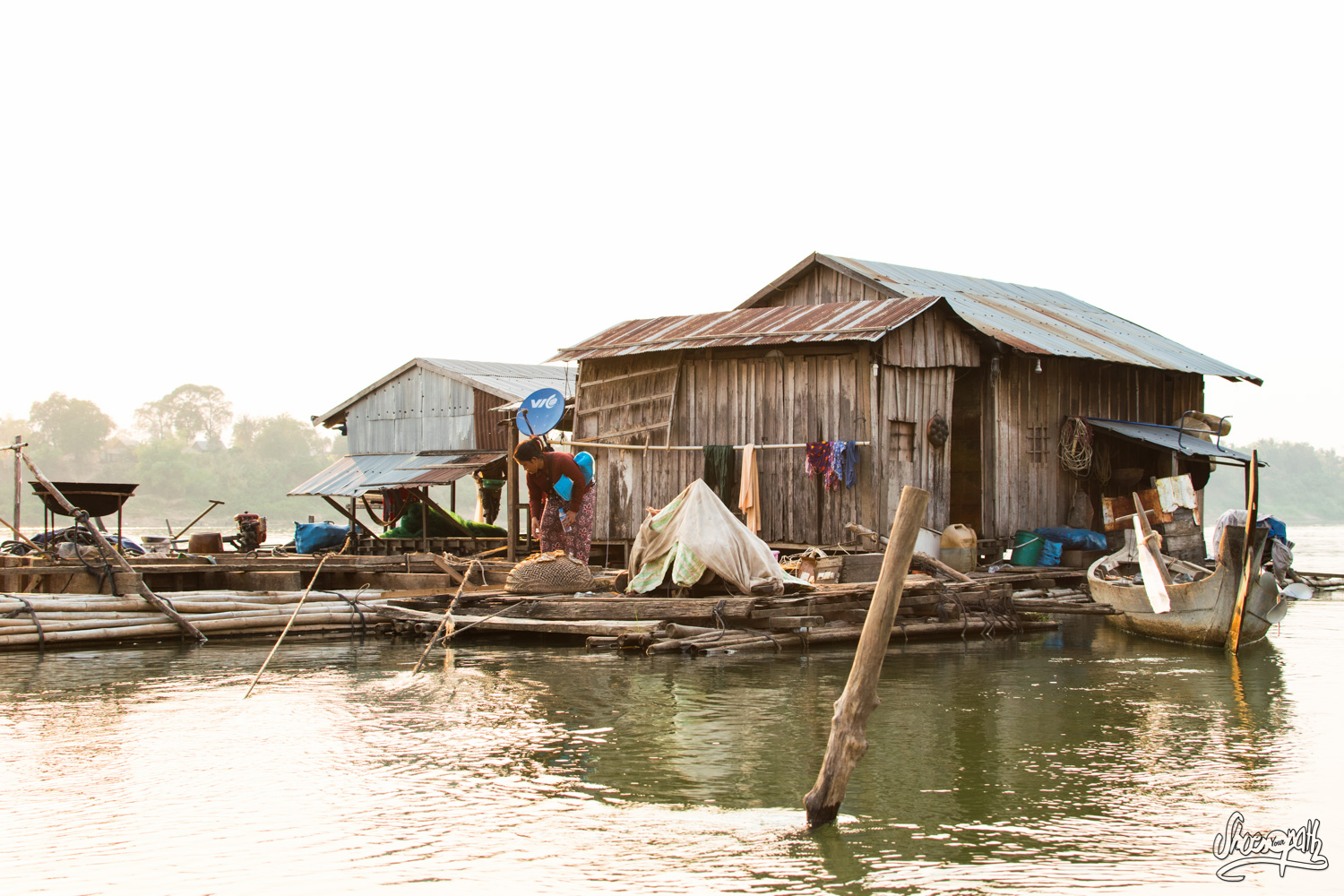 Sunset over the floating village of Kho Trong on the Mekong