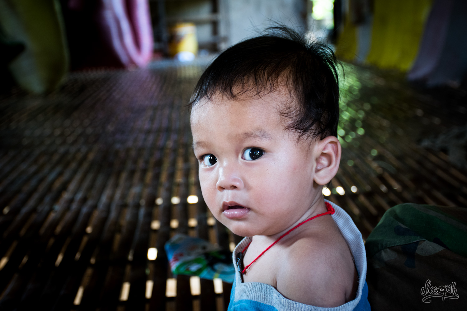 A cute young khmer inside his parent's house